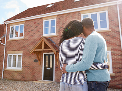 A couple looking at their new home