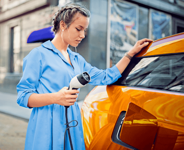 lady-charging-electric-car